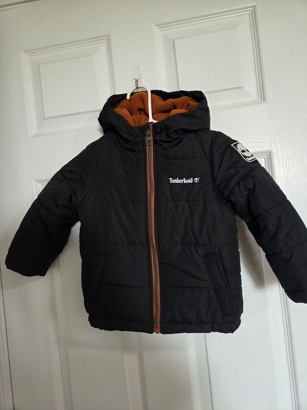 Timberland Kids' Black Puffer Jacket with Orange Lining